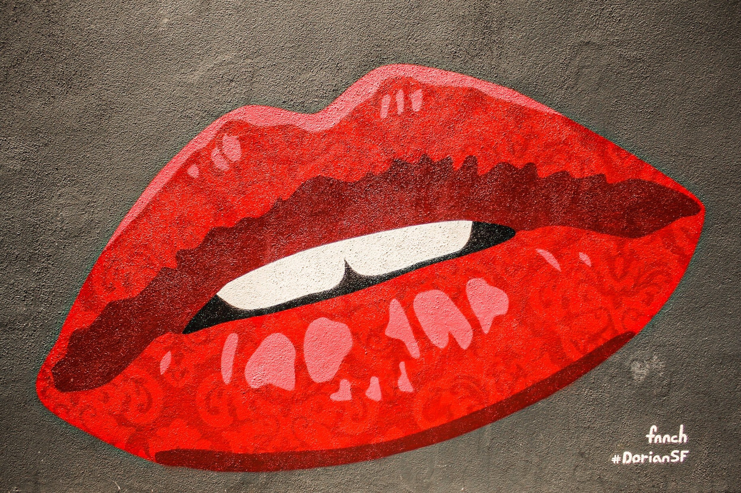 graffitie van rode lippen met 2 witte tanden fnnch dorian sf